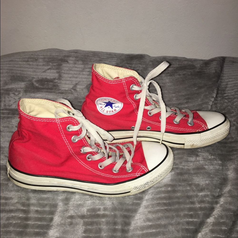 Red high top converse shoes